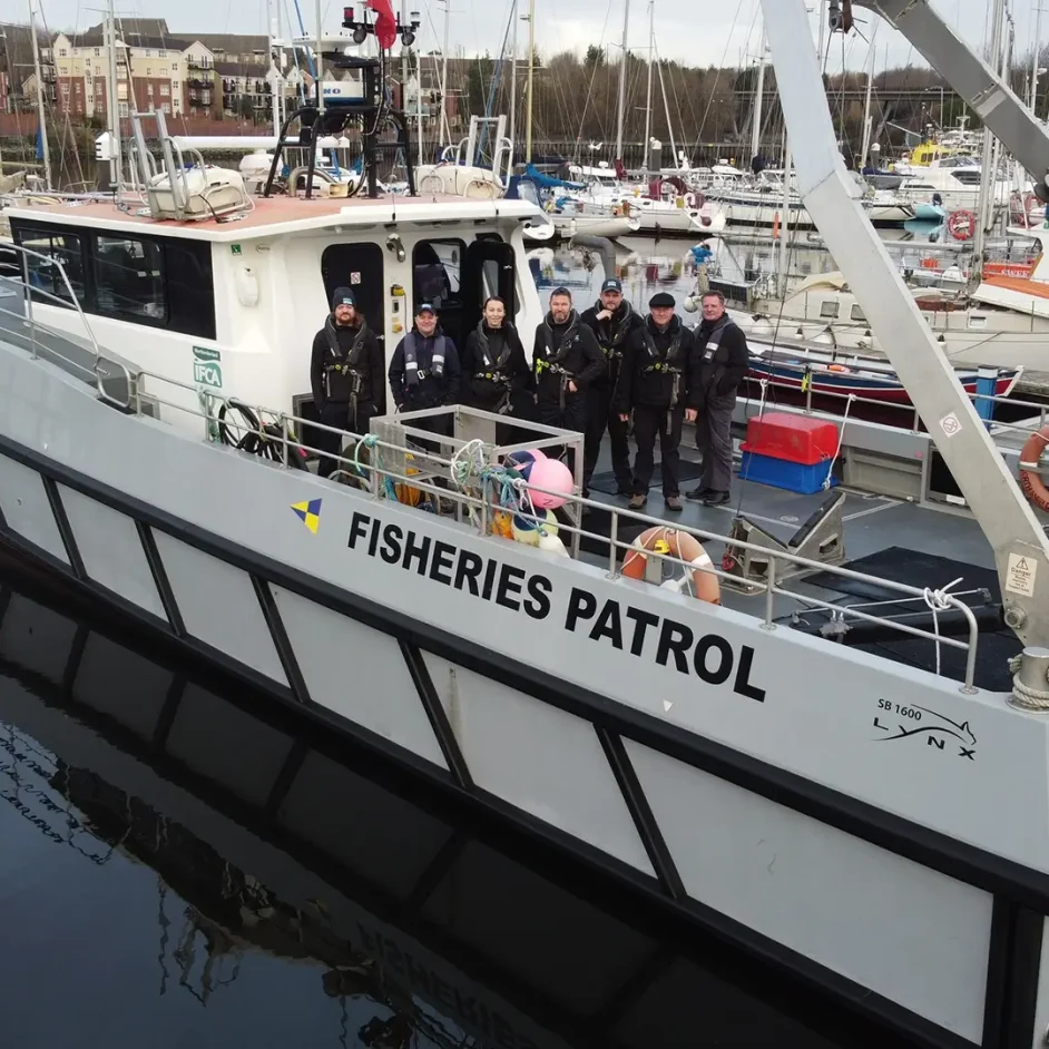 The NIFCA team on board a fisheries patrol vessel docked in Northumberland marina.