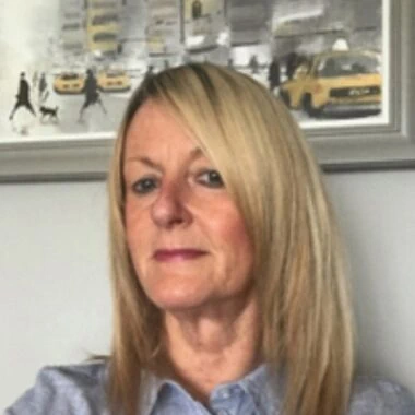Portrait photo of Debra Scott.
