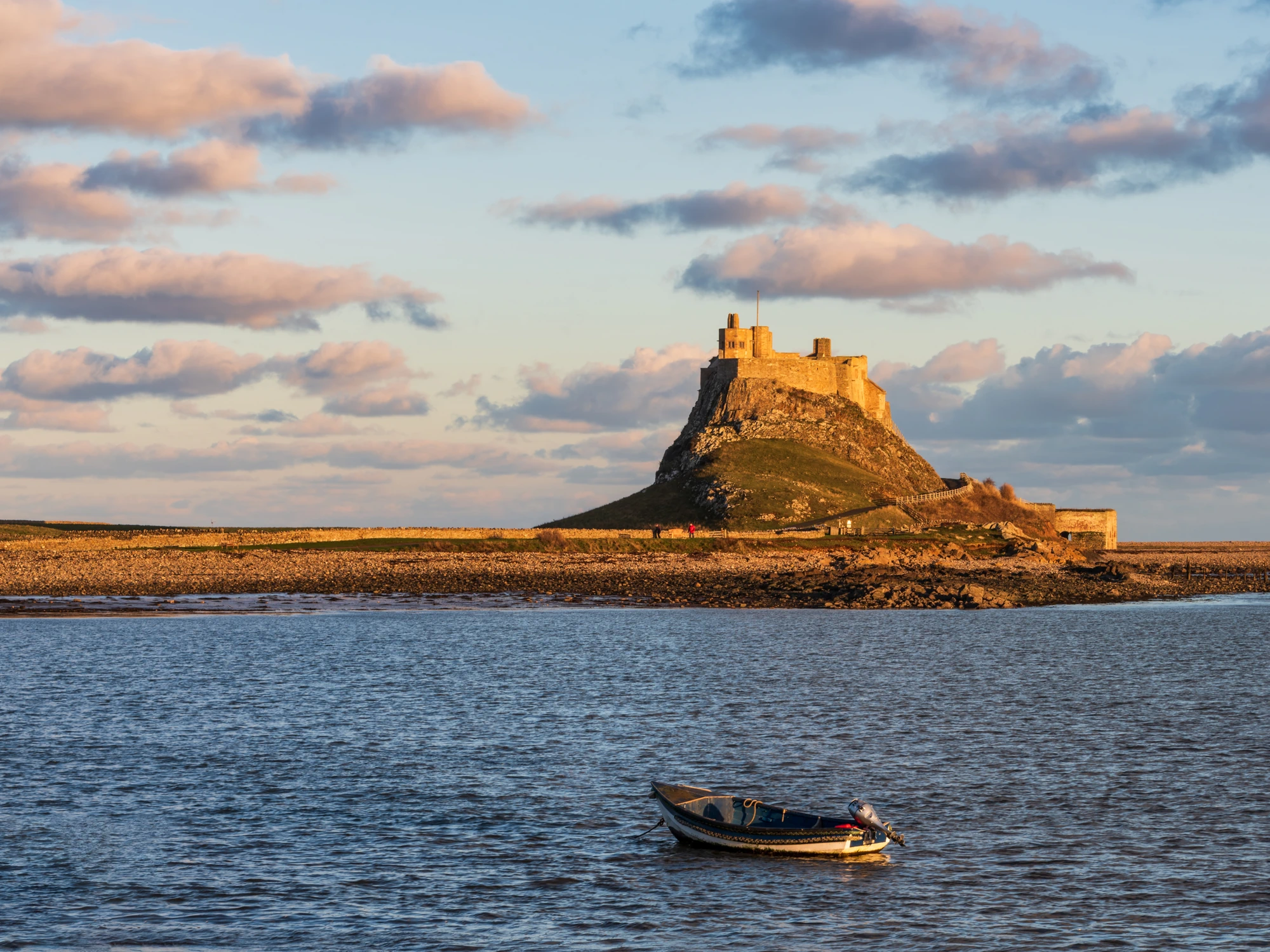 Lindisfarne Castle during a sunset.