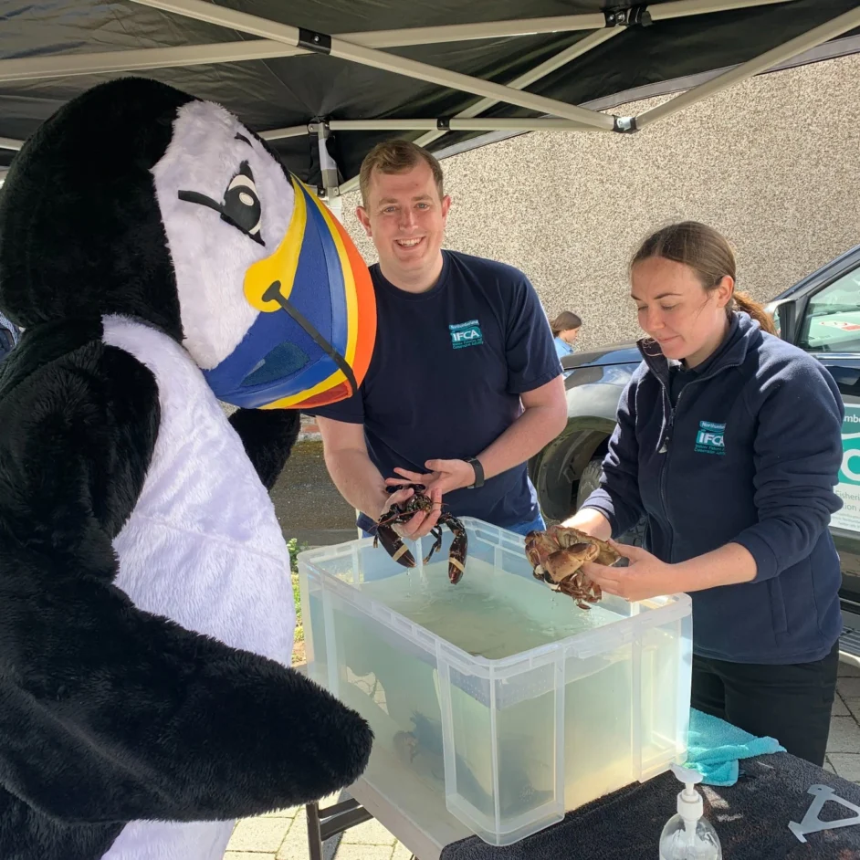 Two NIFCA representatives at Amble Puffin Festival.